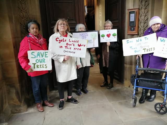 Some of the Ovenden and Illingworth residents held a silent placard protest outside Halifax Town Hall about the proposed cycle lanes as councillors arrived