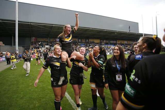 Lacey Owen is hoisted aloft by her team-mates after helping York win the Grand Final. (Photo: Ed Sykes/SWpix.com)