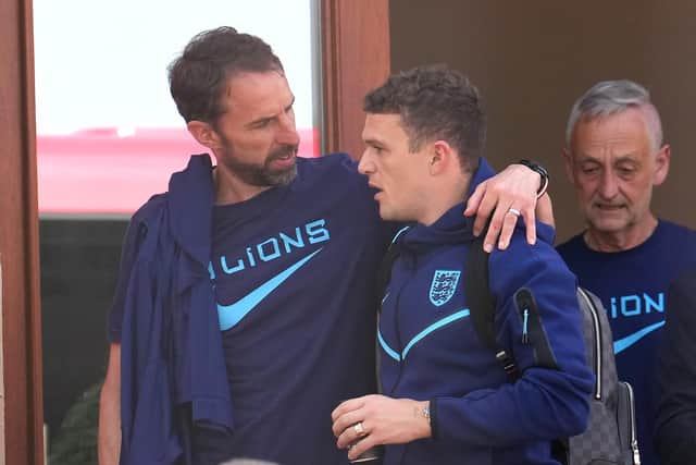 England manager Gareth Southgate (left) and Kieran Trippier outside the Souq Al-Wakra hotel, Qatar, following England's loss to France in their World Cup quarter-final in Al Khor on Saturday. Picture date: Sunday December 11, 2022.