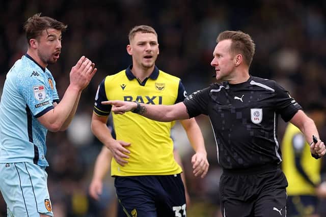 OXFORD, ENGLAND - APRIL 03: Referee Oliver Langford awards a penalty to Oxford United during the Sky Bet Championship match between Oxford United and Hull City at Kassam Stadium on April 03, 2026 in Oxford, England. (Photo by Alex Pantling/Getty Images)