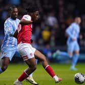Coventry City's Haji Wright (left) and Rotherham United's Peter Kioso battle for the ball during the Sky Bet Championship match in March. Photo: Bradley Collyer/PA Wire.
