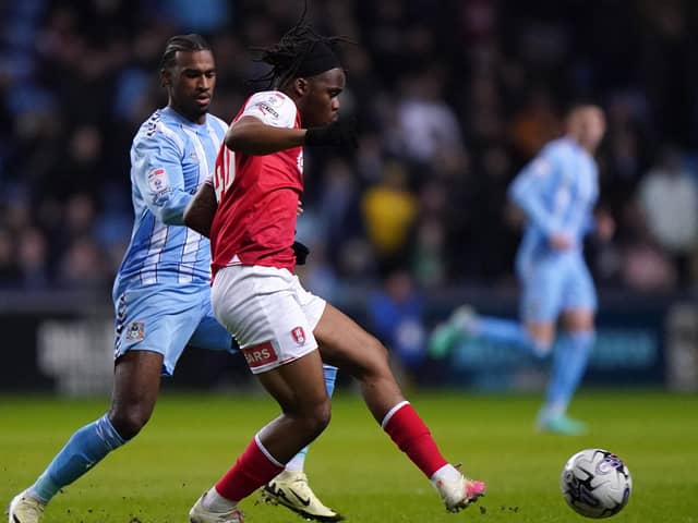 Coventry City's Haji Wright (left) and Rotherham United's Peter Kioso battle for the ball during the Sky Bet Championship match in March. Photo: Bradley Collyer/PA Wire.