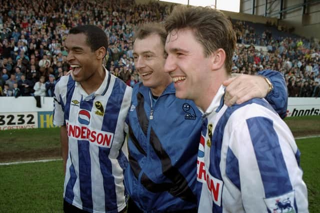 Sheffield Wednesday manager Trevor Francis, centre, celebrates with his strikers Mark Bright and David Hirst after the Coca Cola Cup semi-final against Blackburn Rovers at Hillsborough in Sheffield, England. Sheffield Wednesday won the match 2-1. (Picture: Michael Cooper /Allsport)