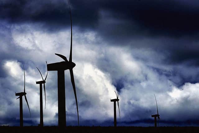 File photo dated 08/07/02  of a generic view of a wind farm as local communities will have the final say in bids to build large scale onshore wind farms under plans set out in the Queen's Speech. PRESS ASSOCIATION Photo. Issue date: Wednesday May 27, 2015. See PA story POLITICS Speech Energy. Photo credit should read: Ben Curtis/PA Wire 