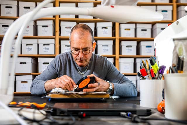 Vinyl artist, Kenny Deane, of Goathland, North Yorkshire, creates visually eye-catching artwork from vinyl records he cuts into shape, then frames. Picture By Yorkshire Post Photographer,  James Hardisty