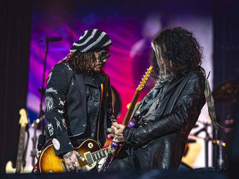 Johnny Depp and Joe Perry perform.