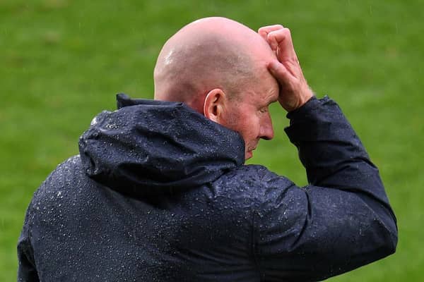 HEAD SCRATCHER: Henrik Pedersen on his last matchday at Sheffield Wednesday manager, a 2-0 defeat at Doncaster Rovers (Image: Steve Ellis)