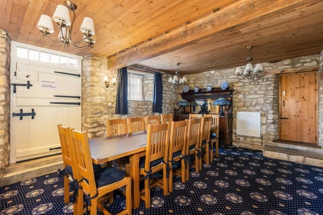 A dining room with plenty of space for family and guests