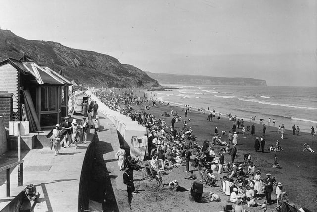 Holidaymakers on the beach at Whitby.