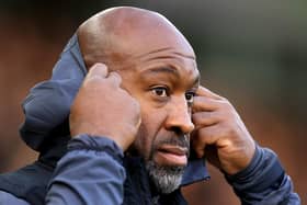 Darren Moore wants Huddersfield Town to look up rather than down. Image: Stephen Pond/Getty Images