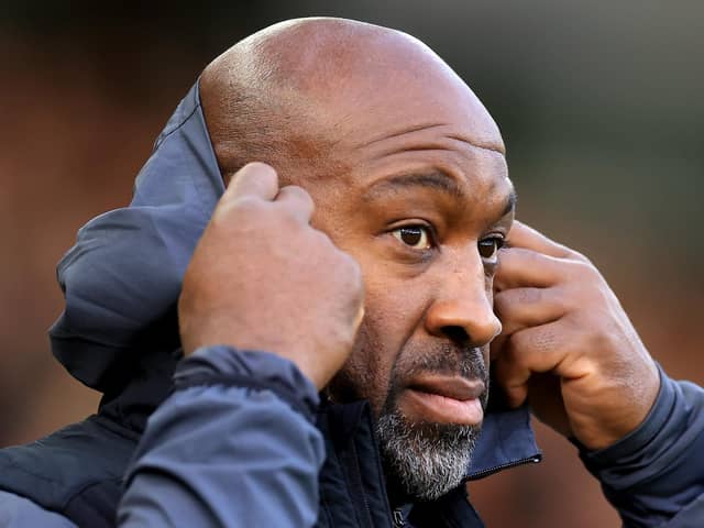 Darren Moore wants Huddersfield Town to look up rather than down. Image: Stephen Pond/Getty Images