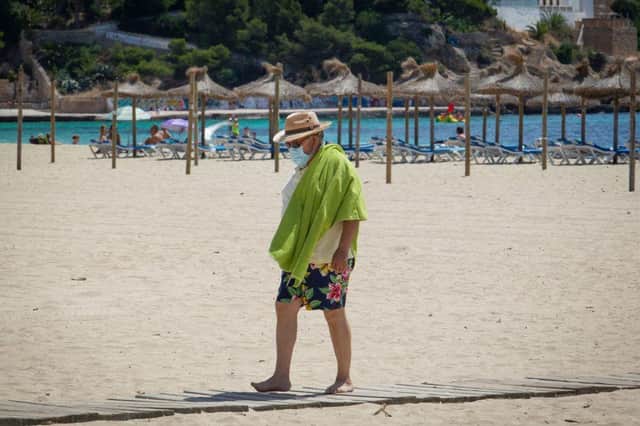 Face mask usage in all public spaces is compulsory in some regions of Spain (Getty Images)