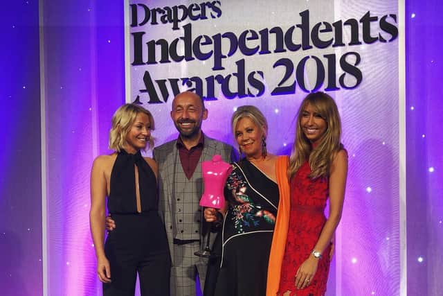Rhona and Julian Blades with the daughters receiving the Drapers 2018 Best Independent award.