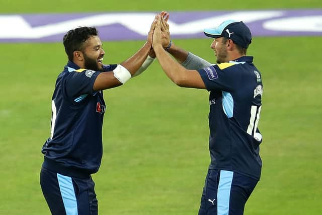 Happier times: Tim Bresnan and Azeem Rafiq celebrate the dismissal of Durham's Ryan Pringle during a T20 Blast match at Headingley in 2016. Photo by Daniel Smith/Getty Images.