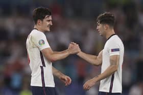 TOGETHER: England's Harry Maguire and John Stones have a long history of playing alongside one another. Picture: Lars Baron/AP