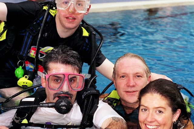 Chris White, Carl Snellson, Mike Harris and Anne Patterson all take part in  a sub-aqua diving session at Ponds Forge for people who have suffered spinal injuries, in 1999