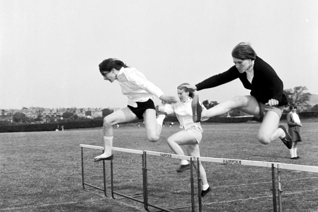 Girls take part in the hurdles race at James Clark School's sports day, held at Liberton's Kirk Brae in June 1966.