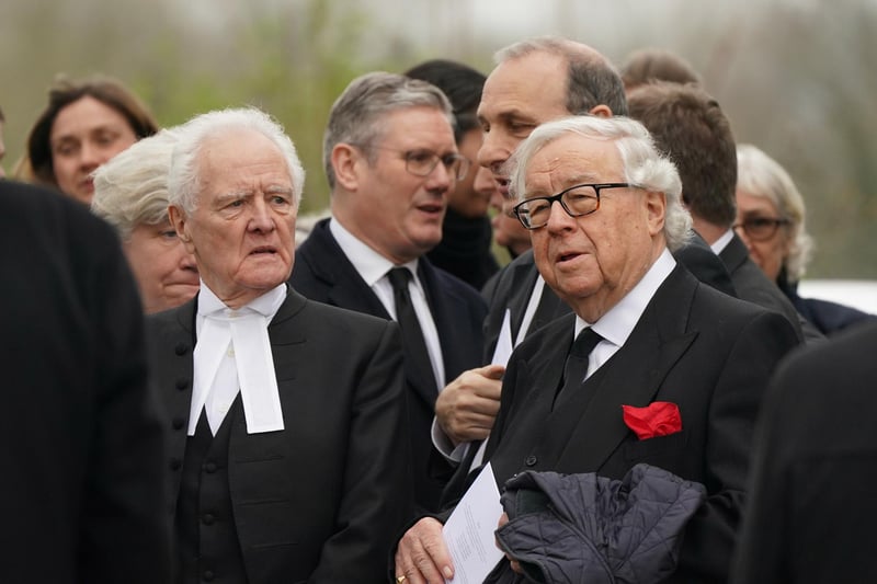 Speaker of the House of Lords, Lord McFall (left) following the funeral.