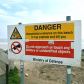 A sign at Mappleton near the former bombing range at Cowden where a team continues to clear ordnance from the beach