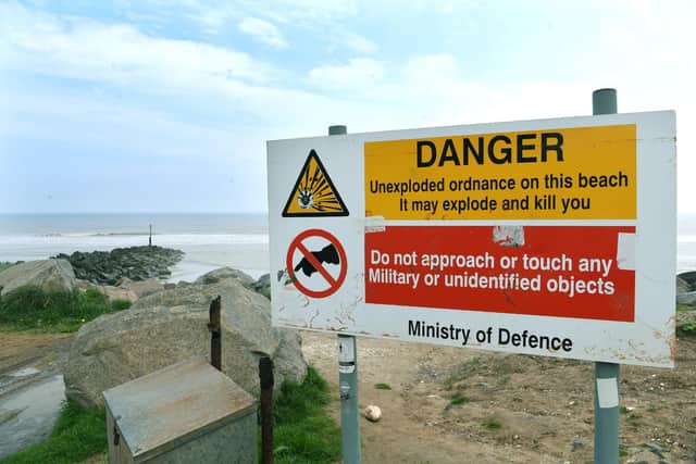 A sign at Mappleton near the former bombing range at Cowden where a team continues to clear ordnance from the beach
