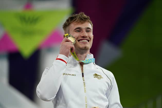 Jack Laugher with his Gold Medal after the Men's 1m Springboard Final at Sandwell Aquatics Centre on day seven of the 2022 Commonwealth Games in Birmingham. Photo credit: Mike Egerton/PA Wire.