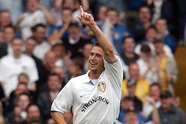 KEWELL DO NICELY:  Harry Kewell celebrates scoring Leeds United's last winning goal against Manchester United at Elland Road, in September 2002 (Image PAUL BARKER/AFP via Getty Images)