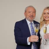 Rachel Woolford winner of the latest series of the BBC programme The Apprentice, with Lord Sugar in the boardroom of Amshold House in Loughton, Essex.  Ian West/PA Wire