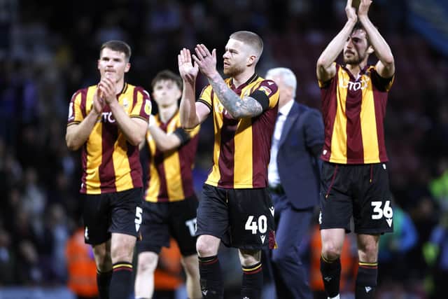 Bradford City's Matthew Platt, Adam Clayton and Sam Stubbs applaud the fans following the Sky Bet League Two play-off semi-final first leg against Carlisle (Picture: Richard Sellers/PA Wire)