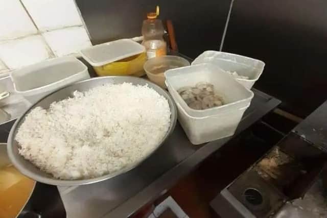 Cross contamination issues were also found, with a container of cooked rice touching a box of raw prawns on the sink drainer.