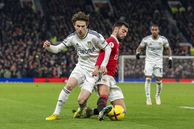 Leeds' Brenden Aaronson tackled by Manchester United's Bruno Fernandes during Wednesday's 2-2 draw. (Picture: Tony Johnson)