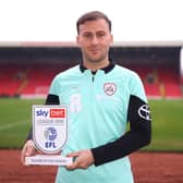 Barnsley midfielder Herbie Kane with the EFL League One player of the month award for December. Picture courtesy of SkyBet.