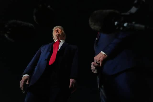 President Donald Trump speaks to reporters before boarding Air Force One. PIC: AP Photo/Julia Demaree Nikhinson