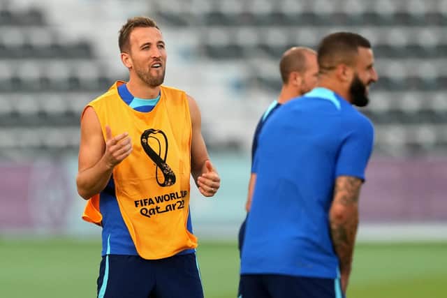 England's Harry Kane and Kyle Walker during a training session at the Al Wakrah Sports Club Stadium in Al Wakrah, Qatar. Picture: Peter Byrne/PA Wire.