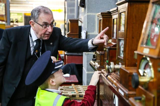 On the occasion of a school party visit to the Railway Museum, Richard Pulleyn demonstrates  block telegraph signalling at the L&Y Signalling School.