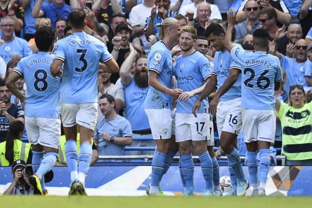A supercomputer has tipped Manchester City to retain their Premier League title by 11 points. Picture: OLI SCARFF/AFP via Getty Images.
