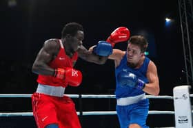 Knockout: Joe Tyers (blue), during his victorious semi-final, came unstuck in the final of the World Boxing Cup GB Open in Sheffield (Picture: Bruce Rollinson)