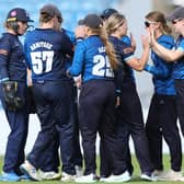 Northern Diamonds' Grace Hall and her team-mates celebrate taking a wicket at Headingley Stadium last season (Picture: SWPix.com)