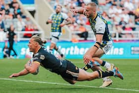 Jacob Miller scores Tigers' opening try in the Magic Weekend win over Leeds. Picture by Alex Whitehead/SWpix.com.