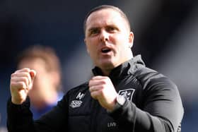 HUDDERSFIELD, ENGLAND - OCTOBER 09: Mark Fotheringham, Manager of Huddersfield Town, celebrates their side's win after the final whistle of the Sky Bet Championship between Huddersfield Town and Hull City at John Smith's Stadium on October 09, 2022 in Huddersfield, England. (Photo by Charlotte Tattersall/Getty Images)