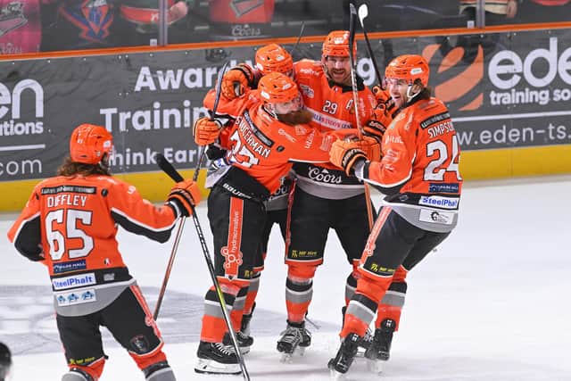 CHAMPIONS: Sheffield Steelers' players celebrate Scott Allen's strike in the 7-3 win at home against |Guildford Flames, the victory enough to secure their first Elite League regular season championship since 2016. Picture: Dean Woolley/Steelers Media.