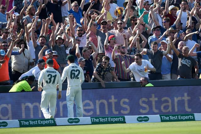 Fans in the Western Terrace celebrate after Ben Stokes of England hits a boundary during day four of the 3rd Specsavers Ashes Test match between England and Australia at Headingley on August 25, 2019 in Leeds (Picture: Gareth Copley/Getty Images)
