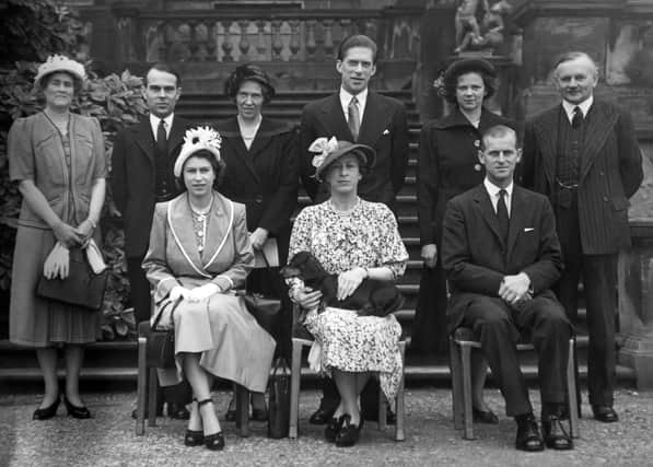 This picture, taken by a Yorkshire Post staff photographer shows the Queen (Princess Elizabeth as she then was) on her visit to Harewood House in 1949.  Left to right, front row, are The Queen, Princess Royal and the Duke of Edinburgh.  Left to right, back row:  Miss Gwynedd Lloyd (Lady-in-Waiting to the Princess Royal), Mr. John Colville (Private Secretary to Princess Elizabeth), The Countess of Scarborough, the Earl of Harewood, the Hon. Mrs. Andrew Elphinstone (Lady-in-Waiting to Princess Elizabeth) and the Earl of Scarborough (Lord Lieutenant of the West Riding and York).
