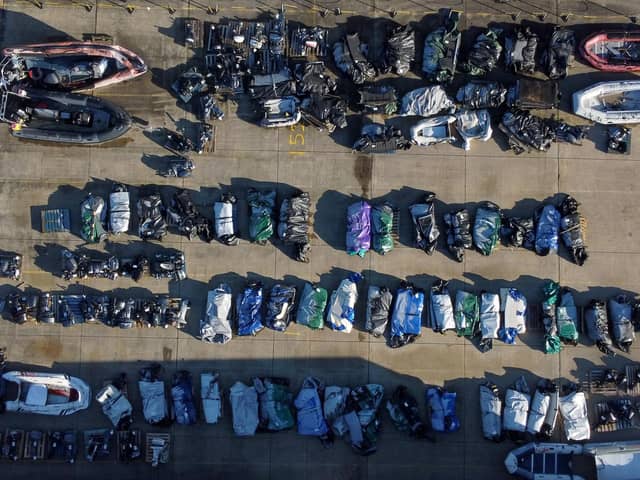 A view of small boats and engines used to cross the Channel by people thought to be migrants. PIC: Gareth Fuller/PA Wire