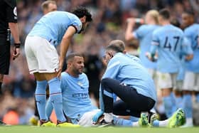 INJURY: Kyle Walker received treatment during Sunday's Manchester derby