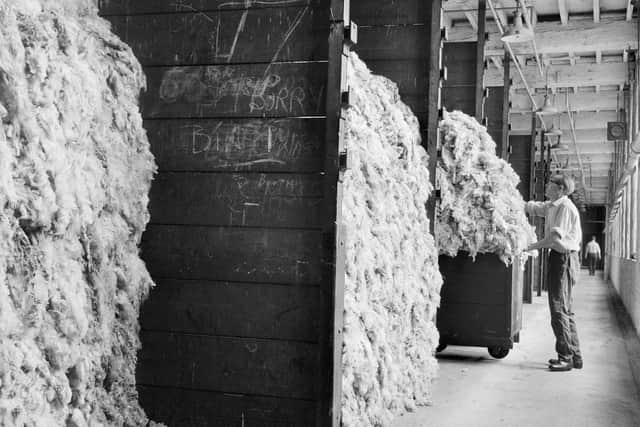 Bays stacked with raw wool in Salts Mill between 1966 and 1974. (Pic credit: English Heritage / Getty Images)