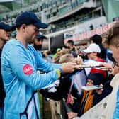 Man in demand: Dan Moriarty signs autographs for the fans after Yorkshire's opening night victory in the Vitality Blast. Picture by Alex Whitehead/SWpix.com