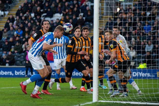 Michal Helik heads in Huddersfield's opening goal. Picture: Bruce Rollinson