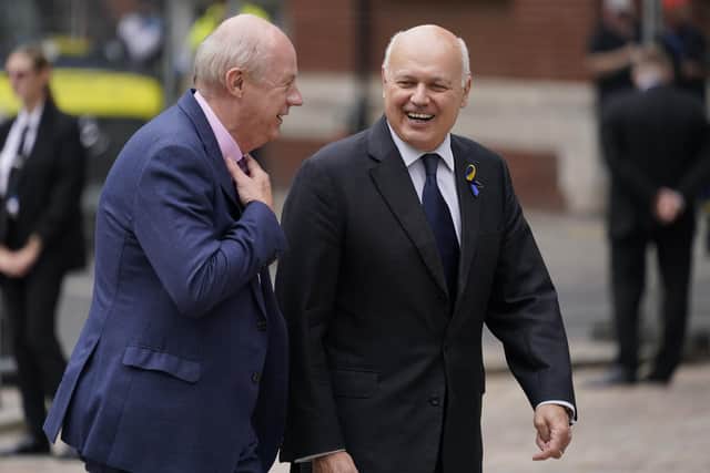 British politician Iain Duncan Smith, right, arrives for the announcement of the result of the Conservative Party leadership contest at the Queen Elizabeth II centre in London, Monday, Sept. 5, 2022. (AP Photo/Alberto Pezzali)