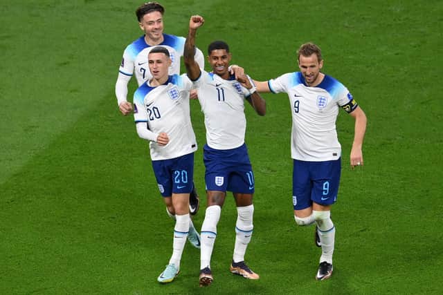 Marcus Rashford of England celebrates with teammates after scoring their team's fifth goal during the FIFA World Cup Qatar 2022 Group B victory over Iran (Picture: Justin Setterfield/Getty Images)
