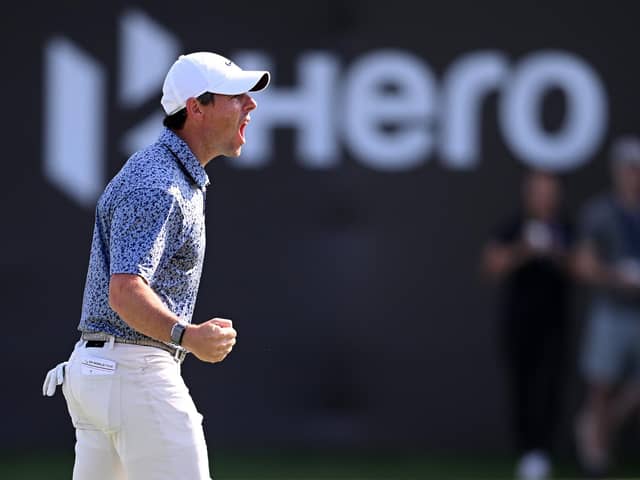 World's best: Rory McIlroy of Northern Ireland celebrates holing a downhill 15-footer on the 18th green to win the Hero Dubai Desert Classic at Emirates Golf Club by one shot from Patrick Reed. (Picture: Ross Kinnaird/Getty Images)